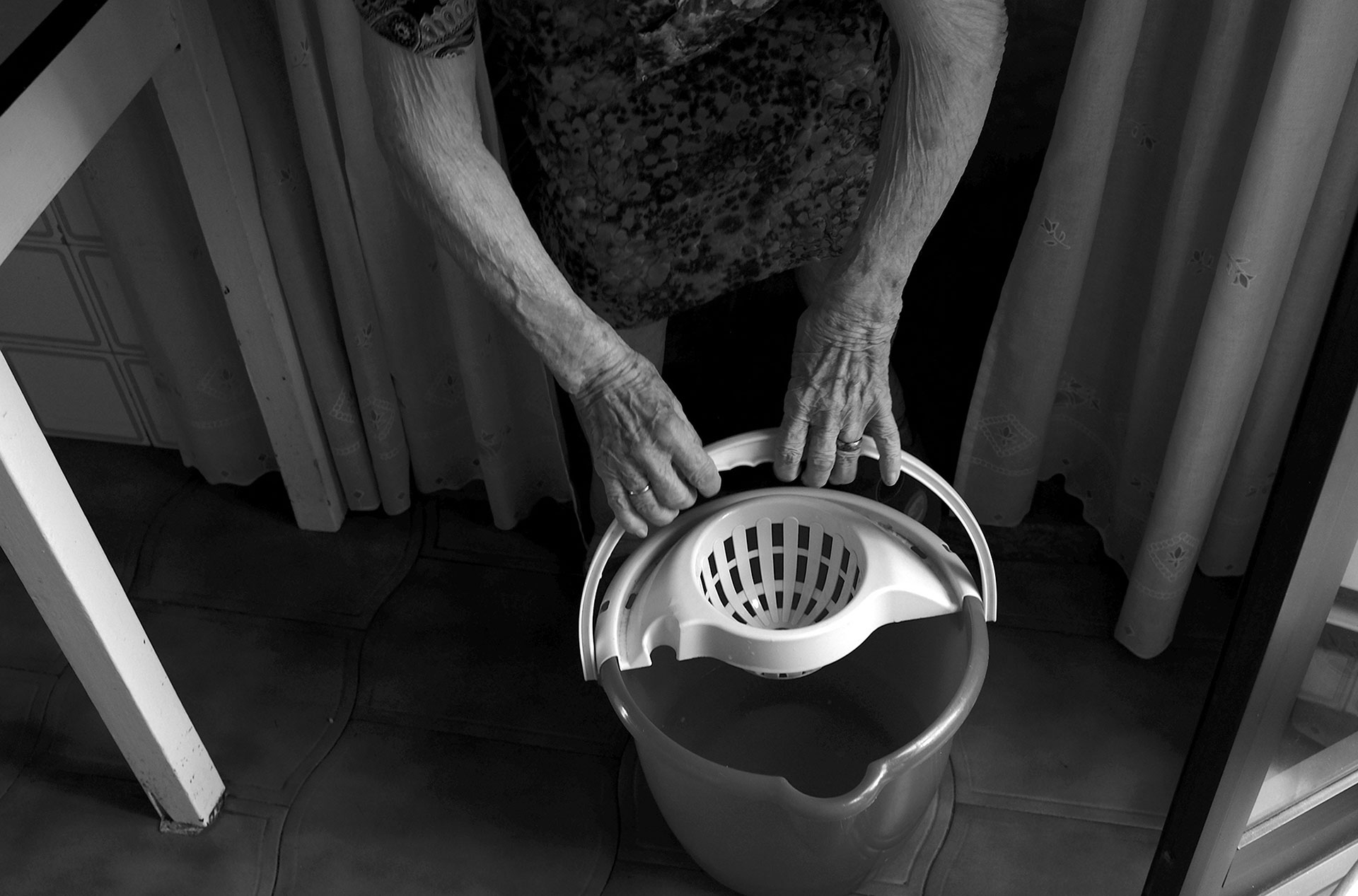 Preparing bucket of water.