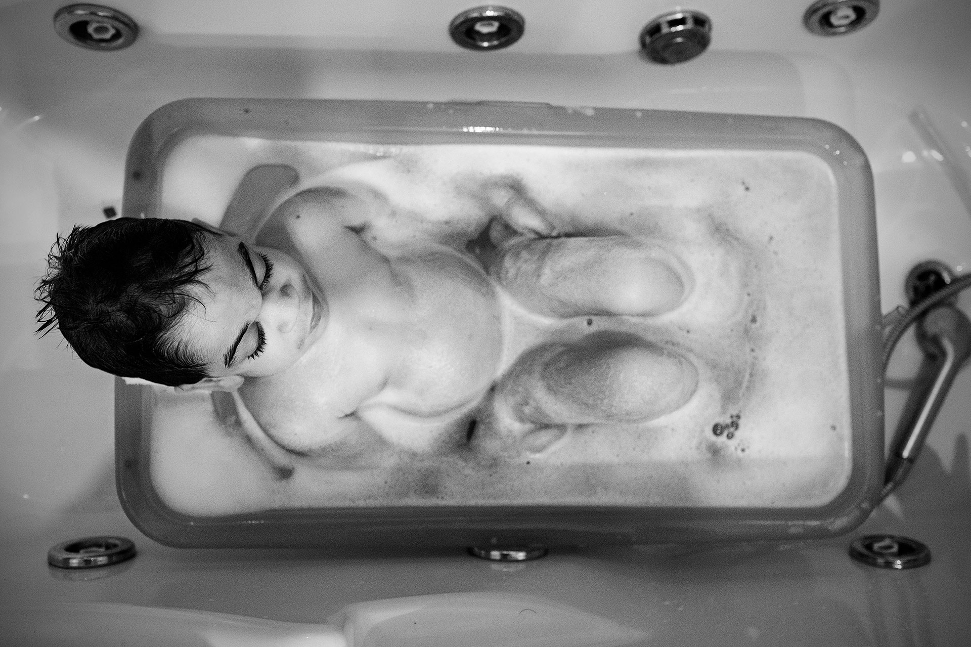 Nacho resting in his bathtu.