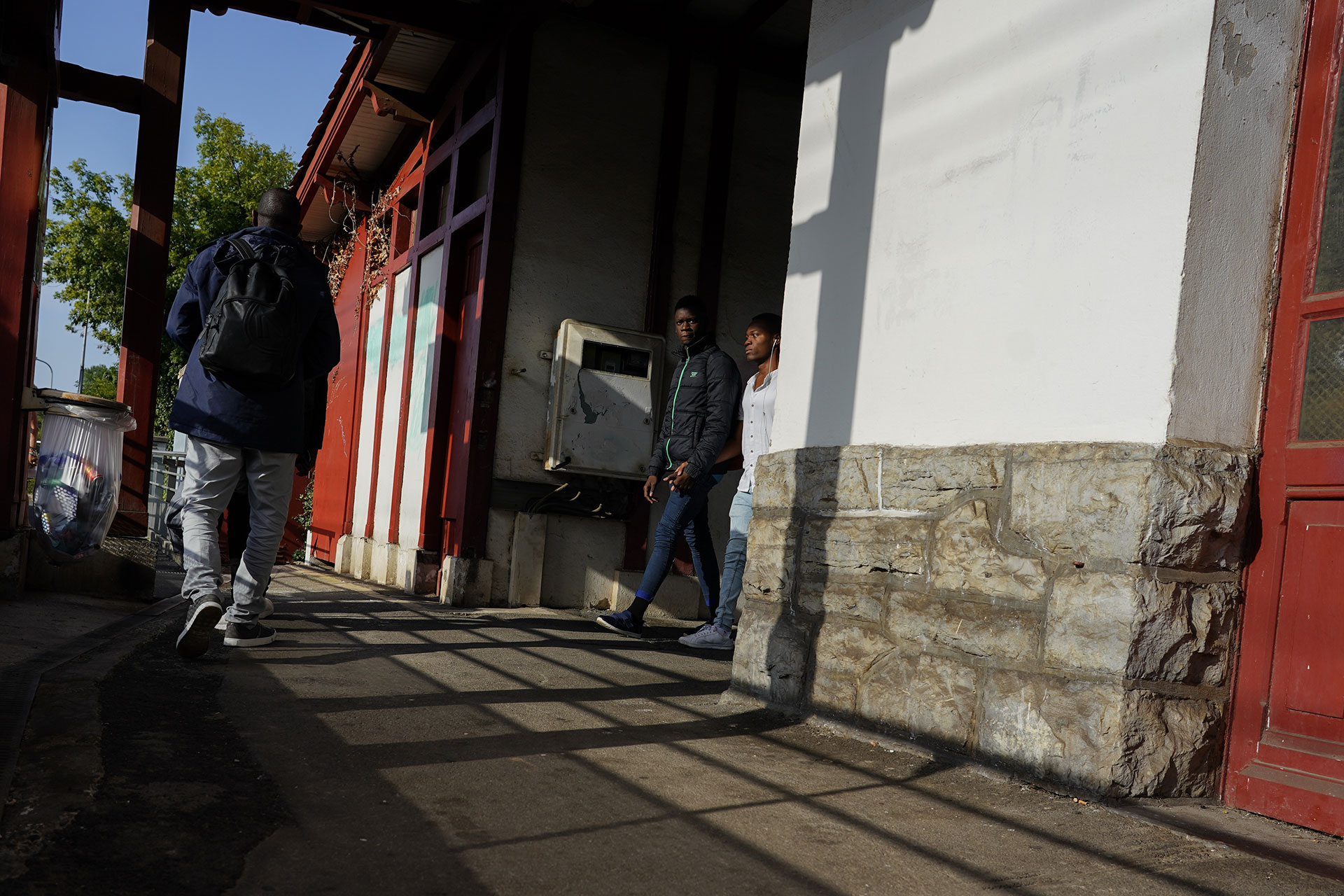 Ousmane arrives at a train station with three companions before taking a train to try to reach Bayonne, September 17, 2019.