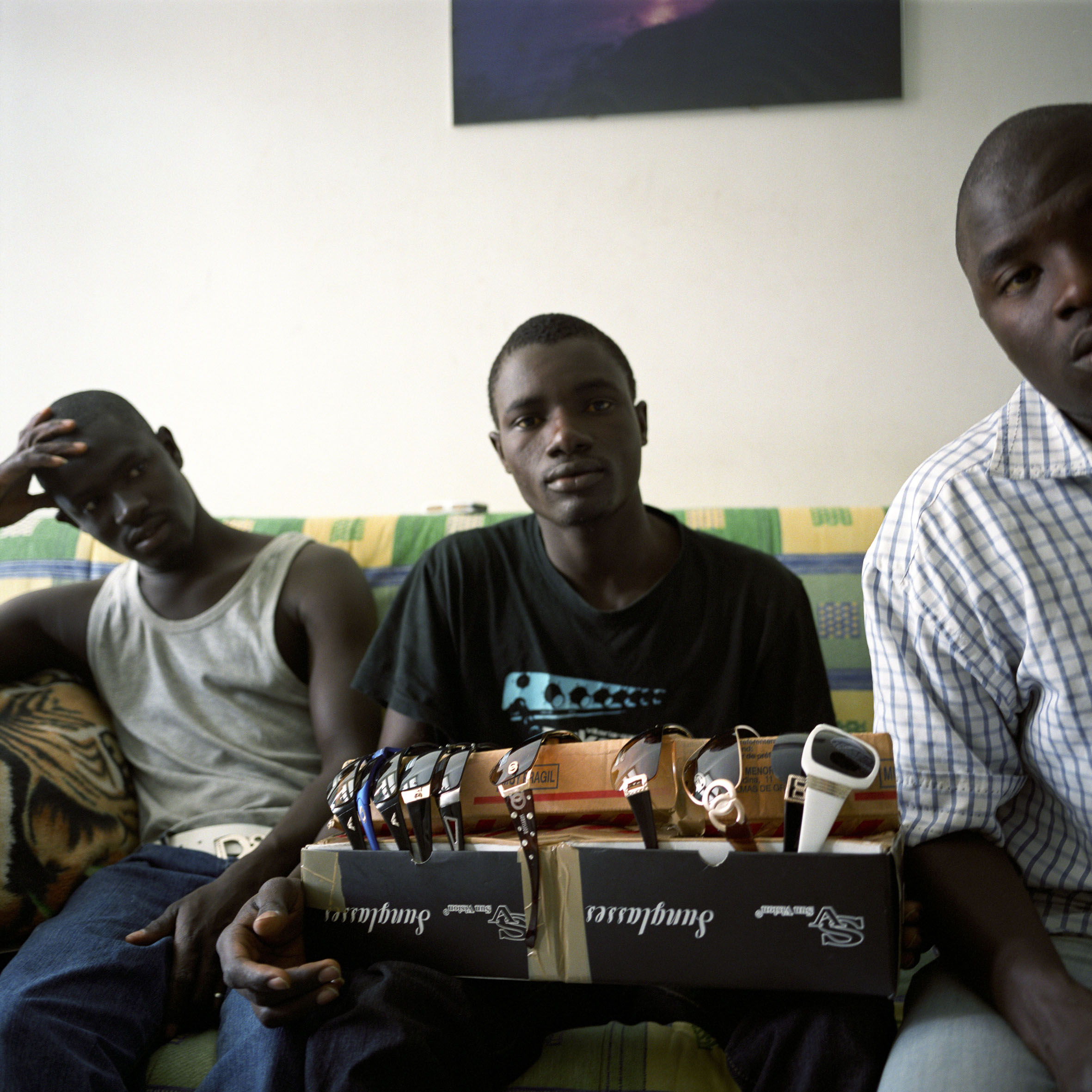 Undocumented immigrants from Senegal sell sunglasses in flea markets around Las Palmas. They arrived in Spain with a boat two years ago, and they all share a small apartment. Once in Europe, undocumented migrants are more at risk of being exploited, working long hours, living in substandard accommodation, and being in poor health.
