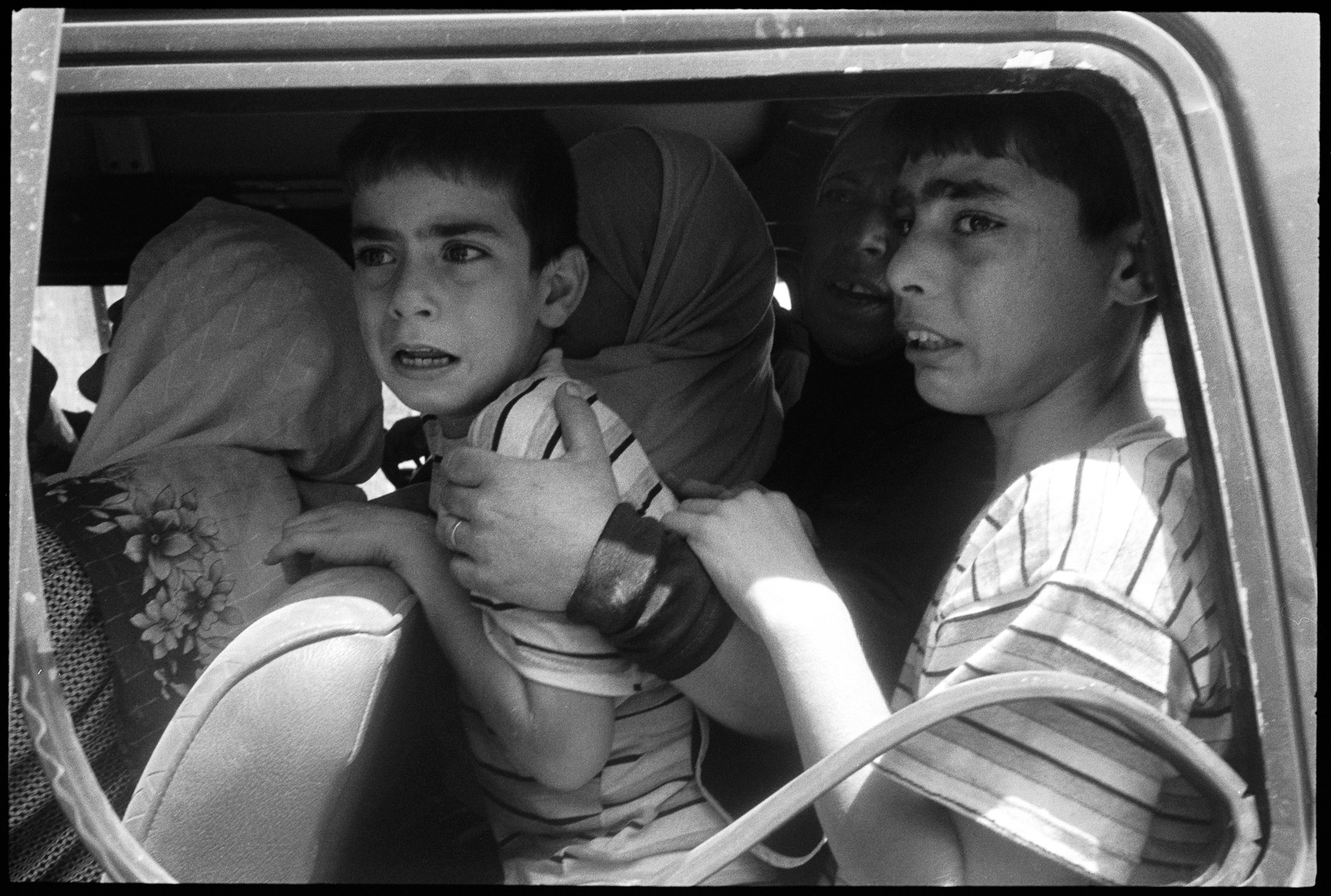 Several families were trapped in their homes for several days while Israeli bombardment flattened many of the surrounding homes. At the time, these brothers feared leaving their father behind in the village, as there were only enough vehicles to evacuate women and children.