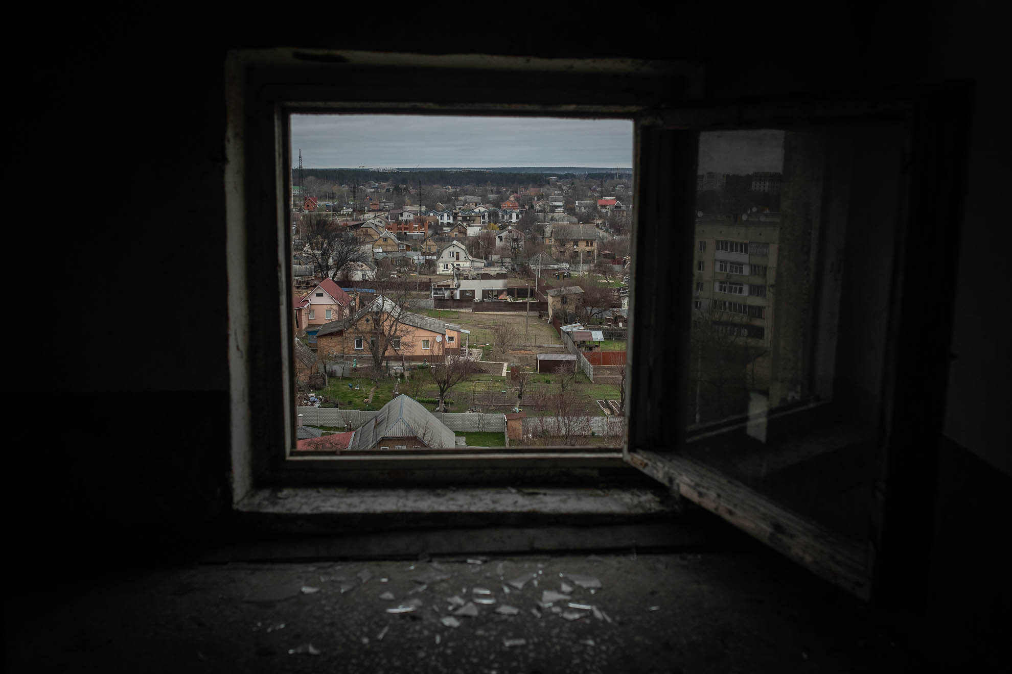 The city of Bucha is seen from a nine-story building on Yablunska Street, where many of the corpses left behind by Russian troops after their retreat were found. This was one of the many buildings occupied by Russian soldiers. From this window, they controlled the civilian population.