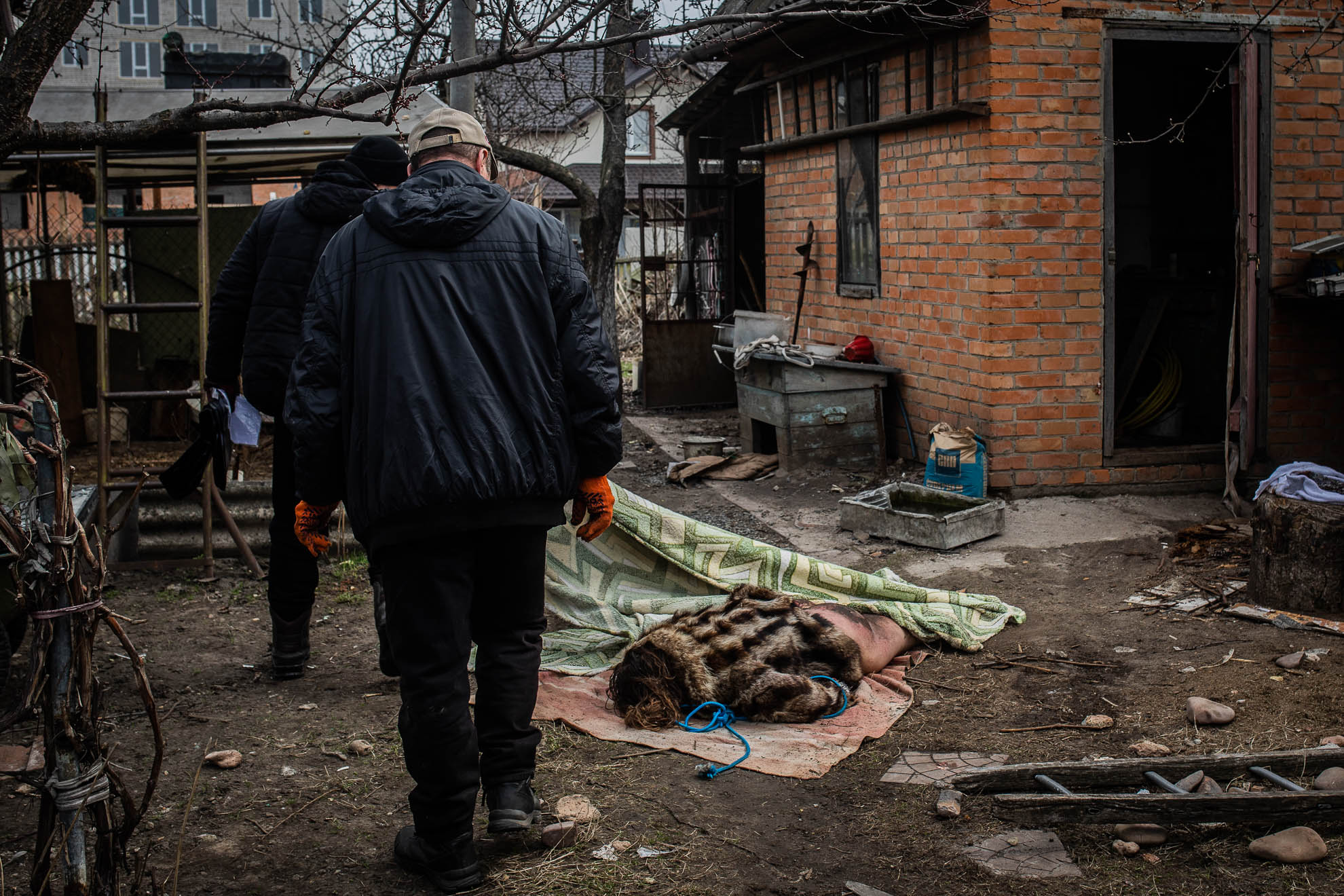 The body of a woman in her 30s was found half-naked - she was wearing only a fur coat - in the basement of a house on Vokzalna Street, which had been occupied by Russian troops. Police searched the body, which was collected on April 8. The body had wounds and burns on her legs. They said that the woman did not reside in the house where she was found and that her identity was not yet known.